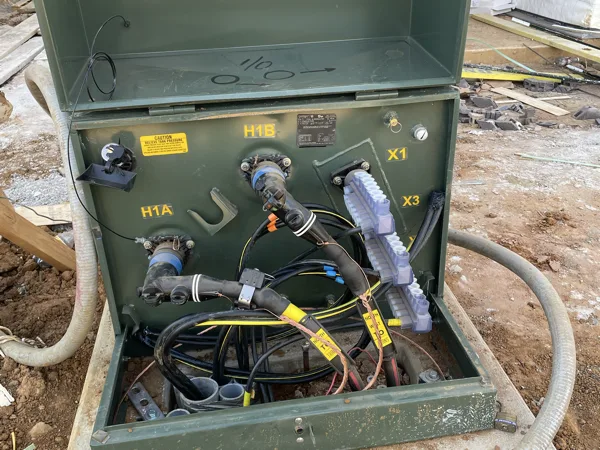 Open pad mounted transformer with the terminations made up