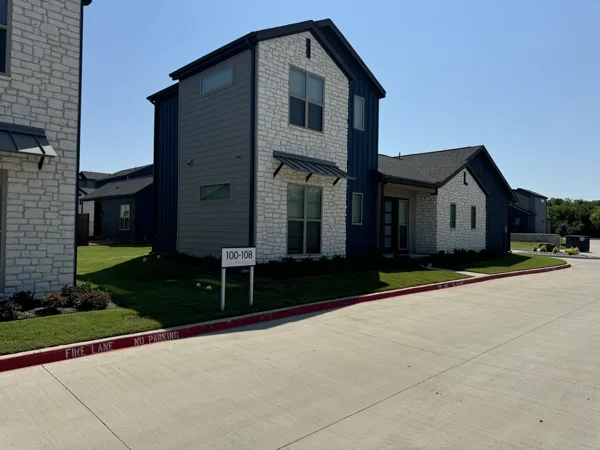 Finished cottage style rental homes along a private street