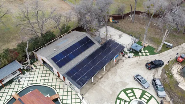 32 kW residential solar array across a garage roof and an attached carport in Carrollton, Texas